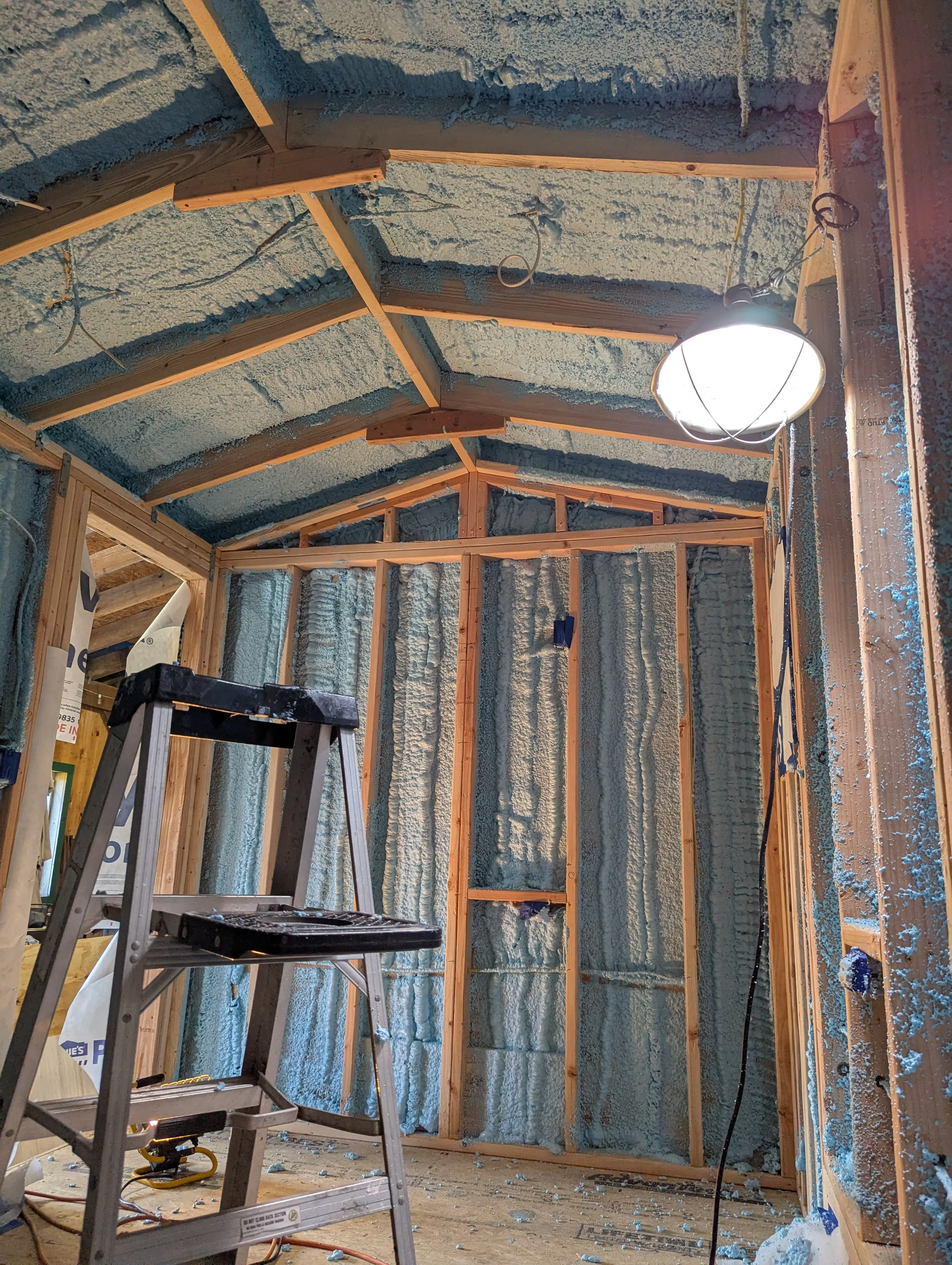 Spray foam insulation applied throughout walls and ceiling