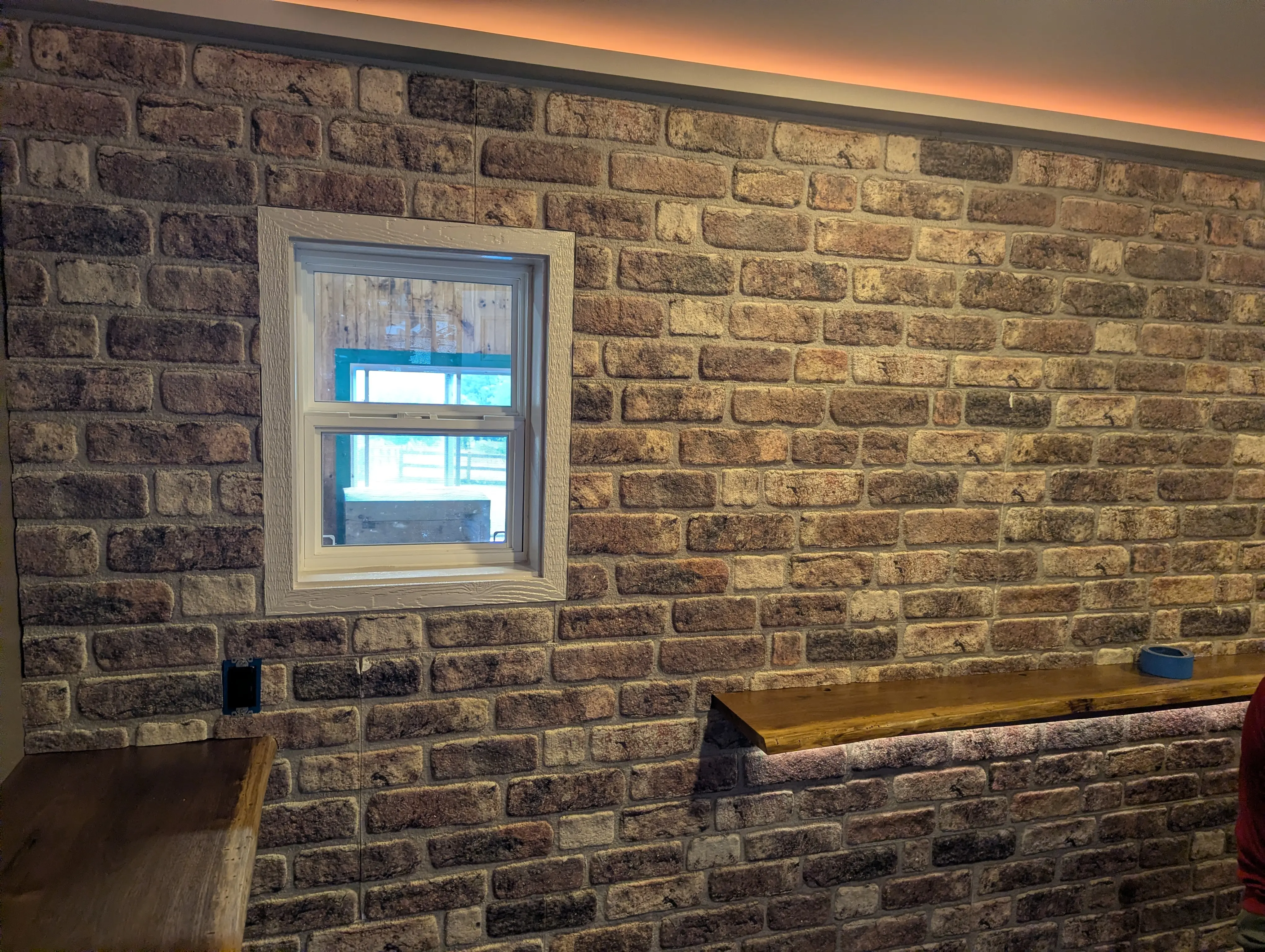 Finished faux brick interior of the Swig Rig